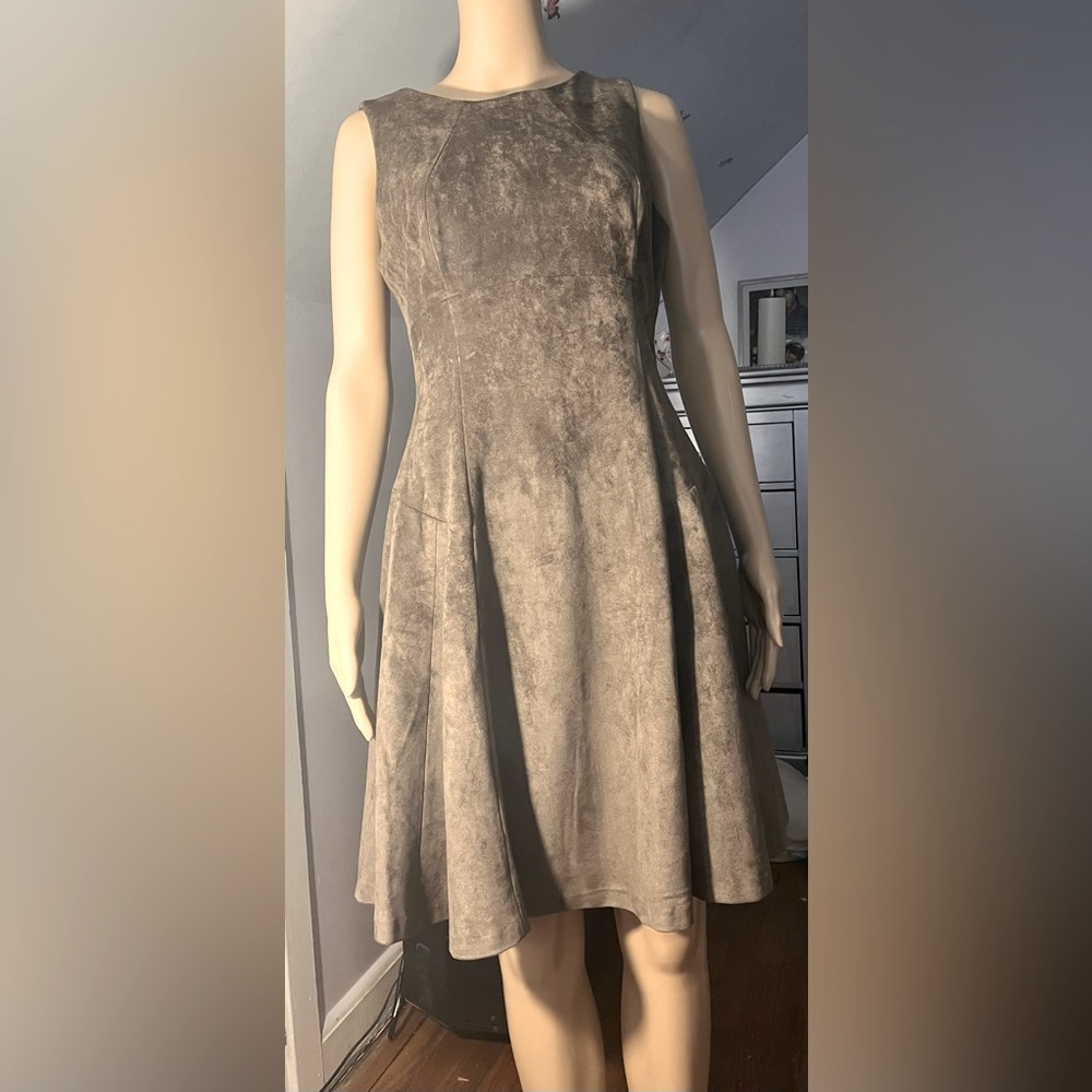Beautiful polyester dress never worn brand new.